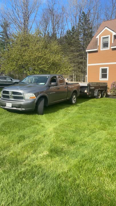 Jasco's Landscaping truck and trailer for lawn care service in Greenfield NY